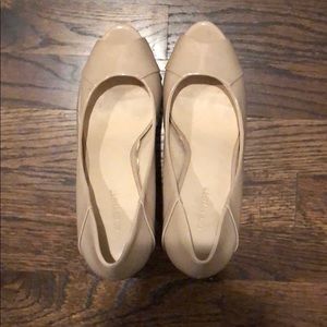 Nine West nude peep toe pumps